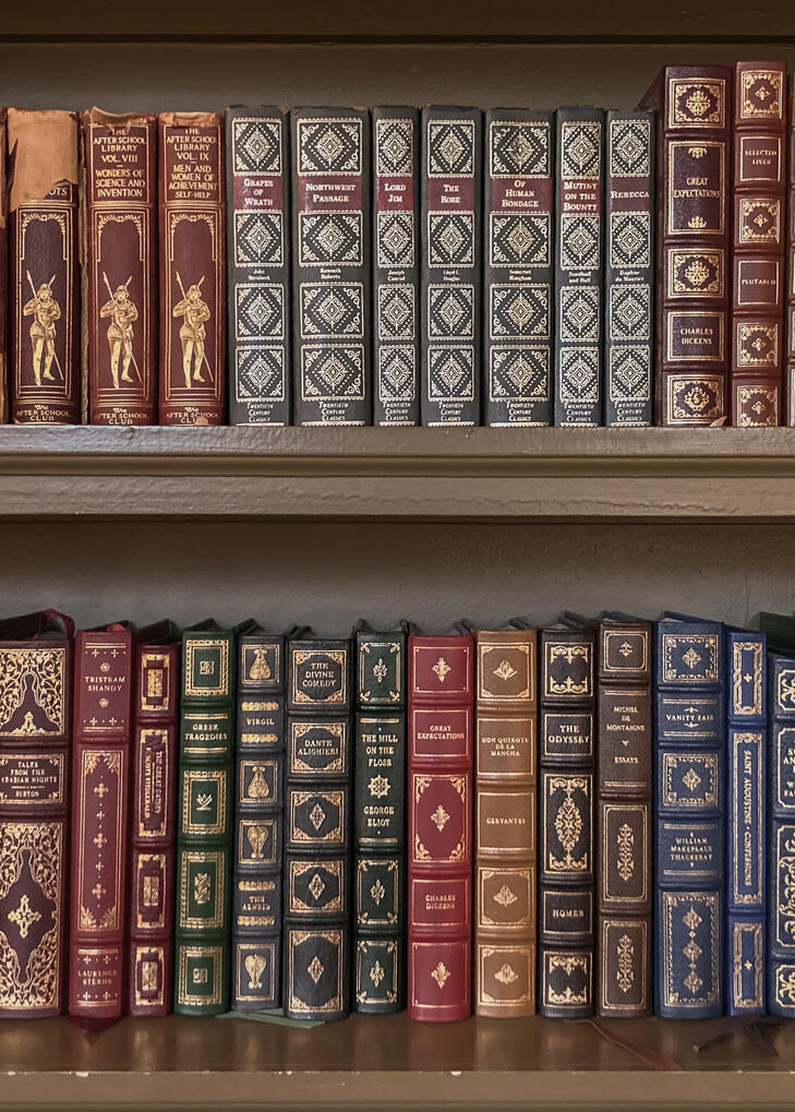Two Shelves of Antique Books Two Shelves of Antique Books on a bookcase.